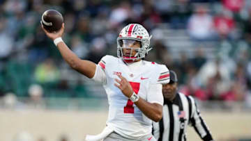 Oct 8, 2022; East Lansing, Michigan, USA; Ohio State Buckeyes quarterback C.J. Stroud (7) throws the ball in the third quarter of the NCAA Division I football game between the Ohio State Buckeyes and Michigan State Spartans at Spartan Stadium.Osu22msu Kwr 61
