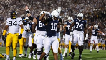 STATE COLLEGE, PA - SEPTEMBER 02: Nicholas Singleton #10 of the Penn State Nittany Lions celebrates after scoring a touchdown against the West Virginia Mountaineers during the first half at Beaver Stadium on September 2, 2023 in State College, Pennsylvania. (Photo by Scott Taetsch/Getty Images)