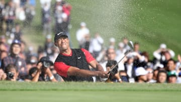 INZAI, JAPAN - OCTOBER 28: Tiger Woods of the United States hits out from a bunker on the 18th hole during the final round of the Zozo Championship at Accordia Golf Narashino Country Club on October 28, 2019 in Inzai, Chiba, Japan. (Photo by Chung Sung-Jun/Getty Images)