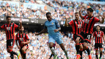 MANCHESTER, ENGLAND - SEPTEMBER 17: Raheem Sterling of Manchester City bursts through the AFC Bournemouth defence during the Premier League match between Manchester City and AFC Bournemouth at Etihad Stadium on September 17, 2016 in Manchester, England. (Photo by Stu Forster/Getty Images)