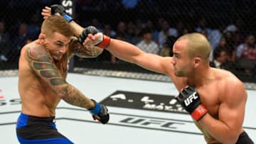 DALLAS, TX - MAY 13: (R-L) Eddie Alvarez punches Dustin Poirier in their lightweight fight during the UFC 211 event at the American Airlines Center on May 13, 2017 in Dallas, Texas. (Photo by Josh Hedges/Zuffa LLC/Zuffa LLC via Getty Images)
