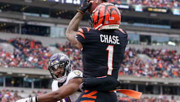 CINCINNATI, OHIO - JANUARY 08: Ja'Marr Chase #1 of the Cincinnati Bengals makes a catch for a touchdown past Daryl Worley #41 of the Baltimore Ravens in the second quarter at Paycor Stadium on January 08, 2023 in Cincinnati, Ohio. (Photo by Dylan Buell/Getty Images)