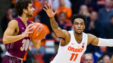 SYRACUSE, NY - NOVEMBER 21: Oshae Brissett #11 of the Syracuse Orange defends against Francisco Amiel #30 of the Colgate Raiders during the second half at the Carrier Dome on November 21, 2018 in Syracuse, New York. (Photo by Brett Carlsen/Getty Images)