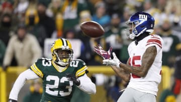 Jan 8, 2017; Green Bay, WI, USA; New York Giants wide receiver Tavarres King (15) catches a touchdown pass against Green Bay Packers cornerback Damarious Randall (23) during the third quarter in the NFC Wild Card playoff football game at Lambeau Field. Mandatory Credit: Jeff Hanisch-USA TODAY Sports