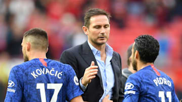 MANCHESTER, ENGLAND - AUGUST 11: Frank Lampard, Manager of Chelsea embraces Mateo Kovacic and Pedro of Chelsea after the Premier League match between Manchester United and Chelsea FC at Old Trafford on August 11, 2019 in Manchester, United Kingdom. (Photo by Michael Regan/Getty Images)