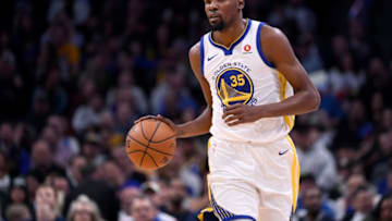 DENVER, CO - FEBRUARY 03: Kevin Durant #35 of the Golden State Warriors dribbles down court against the Denver Nuggets at Pepsi Center on February 3, 2018 in Denver, Colorado. (Photo by Jamie Schwaberow/Getty Images)
