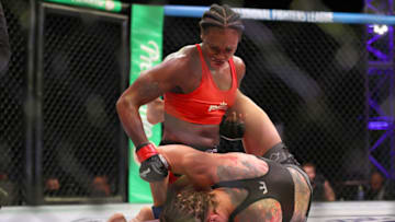 ATLANTIC CITY, NEW JERSEY - JUNE 10: Claressa Shields of the United States punches Brittney Elkin of the United States during the third round of their lightweight bout in Ovation Hall at Ocean Casino Resort on June 10, 2021 in Atlantic City, New Jersey. (Photo by Elsa/Getty Images)