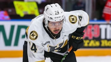 OSHAWA, ONTARIO - JANUARY 23: Zayde Wisdom #74 of the Kingston Frontenacs looks on prior to a faceoff against the Oshawa Generals at Tribute Communities Centre on January 23, 2022 in Oshawa, Ontario. (Photo by Chris Tanouye/Getty Images)