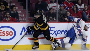 Jan 19, 2016; Montreal, Quebec, CAN; Montreal Canadiens defenseman Andrei Markov (79) misses his check on Boston Bruins forward Frank Vatrano (72) during the third period at the Bell Centre. Mandatory Credit: Eric Bolte-USA TODAY Sports
