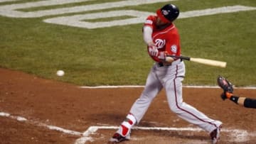 Oct 7, 2014; San Francisco, CA, USA; Washington Nationals left fielder Bryce Harper (34) hits a RBI double against the San Francisco Giants during the fifth inning of game four of the 2014 NLDS baseball playoff game at AT&T Park. Mandatory Credit: Kelley L Cox-USA TODAY Sports