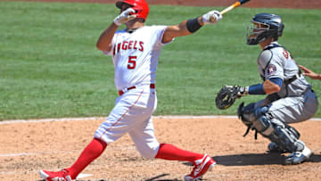 ANAHEIM, CA - AUGUST 02: Albert Pujols #5 of the Los Angeles Angels hits a grand slam home run as Dustin Garneau #13 of the Houston Astros looks on in the third inning of the game of Anaheim on August 2, 2020 in Anaheim, California. (Photo by Jayne Kamin-Oncea/Getty Images)
