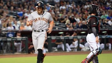Sep 10, 2016; Phoenix, AZ, USA; San Francisco Giants right fielder Hunter Pence (8) scores a run against the Arizona Diamondbacks during the second inning at Chase Field. Mandatory Credit: Joe Camporeale-USA TODAY Sports