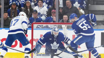 Apr 27, 2023; Toronto, Ontario, CAN; Tampa Bay Lightning left wing Alex Killorn (17) battles for the puck with Toronto Maple Leafs defenseman Mark Giordano (55) in front of Toronto goaltender Ilya Samsonov (35) during the first period in game five of the first round of the 2023 Stanley Cup Playoffs at Scotiabank Arena. Mandatory Credit: Nick Turchiaro-USA TODAY Sports