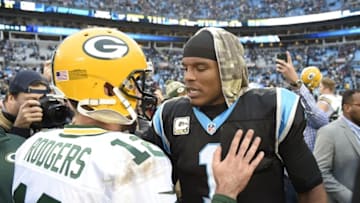 Nov 8, 2015; Charlotte, NC, USA; Green Bay Packers quarterback Aaron Rodgers (12) with Carolina Panthers quarterback Cam Newton (1) after the game. The Panthers defeated the Packers 37-29 at Bank of America Stadium. Mandatory Credit: Bob Donnan-USA TODAY Sports