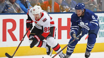 TORONTO, ON - OCTOBER 6: Mikkel Boedker #89 of the Ottawa Senators skates away from a checking Zach Hyman #11 of the Toronto Maple Leafs during an NHL game at Scotiabank Arena on October 6, 2018 in Toronto, Ontario, Canada. The Senators defeated the Maple Leafs 5-3.(Photo by Claus Andersen/Getty Images)