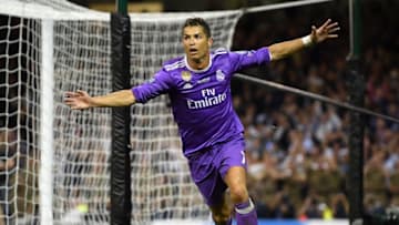 CARDIFF, WALES - JUNE 03: Cristiano Ronaldo of Real Madrid celebrates scoring his sides third goal during the UEFA Champions League Final between Juventus and Real Madrid at National Stadium of Wales on June 3, 2017 in Cardiff, Wales. (Photo by Matthias Hangst/Getty Images)