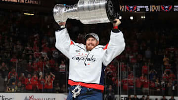 LAS VEGAS, NV - JUNE 07: Philipp Grubauer #31 of the Washington Capitals hoists the Stanley Cup after Game Five of the 2018 NHL Stanley Cup Final between the Washington Capitals and the Vegas Golden Knights at T-Mobile Arena on June 7, 2018 in Las Vegas, Nevada. The Capitals defeated the Golden Knights 4-3 to win the Stanley Cup Final Series 4-1. (Photo by Dave Sandford/NHLI via Getty Images)