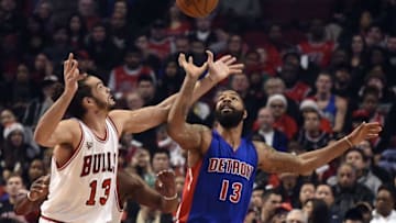 Dec 18, 2015; Chicago, IL, USA; Chicago Bulls center Joakim Noah (13) and Detroit Pistons forward Marcus Morris (13) go for the ball during the first half at the United Center. Mandatory Credit: David Banks-USA TODAY Sports