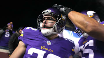 MINNEAPOLIS, MN - DECEMBER 27: Harrison Smith #22 and Anthony Barr #55 of the Minnesota Vikings celebrate Smith's interception for a touchdown in the second quarter against the New York Giants on December 27, 2015 at TCF Bank Stadium in Minneapolis, Minnesota. (Photo by Adam Bettcher/Getty Images)