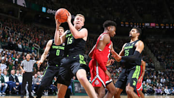 EAST LANSING, MI - FEBRUARY 17: Thomas Kithier #15 of the Michigan State Spartans grabs a rebound in the second half during a game against the Ohio State Buckeyes at Breslin Center on February 17, 2019 in East Lansing, Michigan. (Photo by Rey Del Rio/Getty Images)
