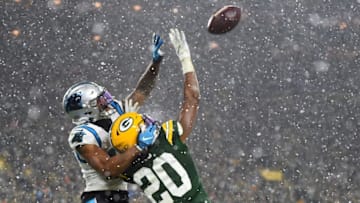 GREEN BAY, WISCONSIN - NOVEMBER 10: Kevin King #20 of the Green Bay Packers defends a pass intended for D.J. Moore #12 of the Carolina Panthers during a game at Lambeau Field on November 10, 2019 in Green Bay, Wisconsin. The Packers defeated the Panthers 24-16. (Photo by Stacy Revere/Getty Images)