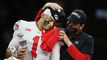 NEW ORLEANS, LOUISIANA - JANUARY 01: Justin Fields #1 and head coach Ryan Day of the Ohio State Buckeyes react after defeating the Clemson Tigers 49-28 during the College Football Playoff semifinal game at the Allstate Sugar Bowl at Mercedes-Benz Superdome on January 01, 2021 in New Orleans, Louisiana. (Photo by Chris Graythen/Getty Images)