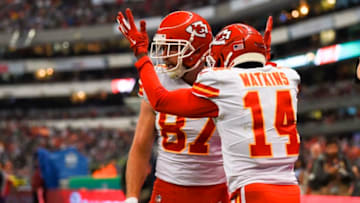 Kansas City Chiefs tight end Travis Kelce (L) celebrates his touchdown with teammate Sammy Watkins during the 2019 NFL week 11 regular season football game between Kansas City Chiefs and Los Angeles Chargers on November 18, 2019, at the Azteca Stadium in Mexico City. (Photo by PEDRO PARDO / AFP) (Photo by PEDRO PARDO/AFP via Getty Images)