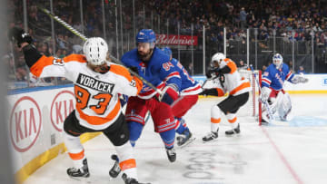 NEW YORK, NY - DECEMBER 23: Adam McQuaid #54 of the New York Rangers knocks down Jakub Voracek #93 of the Philadelphia Flyers at Madison Square Garden on December 23, 2018 in New York City. (Photo by Jared Silber/NHLI via Getty Images)