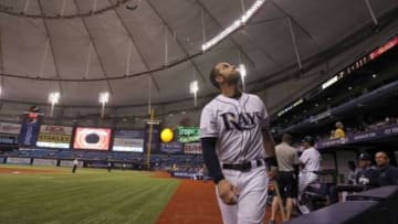 Sep 3, 2014; St. Petersburg, FL, USA; Tampa Bay Rays third baseman Evan Longoria (3) looks up as play was delayed during the third inning as as there was a power outage against the Toronto Blue Jays at Tropicana Field. Mandatory Credit: Kim Klement-USA TODAY Sports