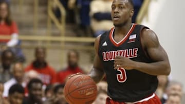 Jan 25, 2015; Pittsburgh, PA, USA; Louisville Cardinals guard Chris Jones (3) brings the ball up court against the Pittsburgh Panthers during the first half at the Petersen Events Center. Mandatory Credit: Charles LeClaire-USA TODAY Sports