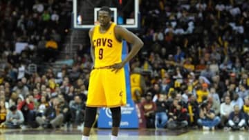 Jan 26, 2014; Cleveland, OH, USA; Cleveland Cavaliers small forward Luol Deng (9) reacts in the fourth quarter against the Phoenix Suns at Quicken Loans Arena. Mandatory Credit: David Richard-USA TODAY Sports