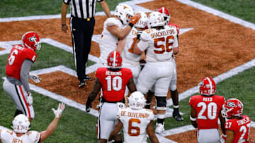 NEW ORLEANS, LOUISIANA - JANUARY 01: Sam Ehlinger #11 of the Texas Longhorns celebrates a touchdown during the first half of the Allstate Sugar Bowl against the Georgia Bulldogs at the Mercedes-Benz Superdome on January 01, 2019 in New Orleans, Louisiana. (Photo by Jonathan Bachman/Getty Images)