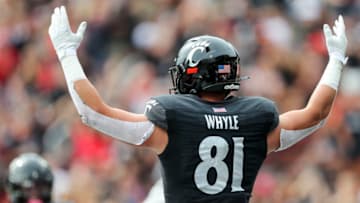 Cincinnati Bearcats tight end Josh Whyle reacts after scoring touchdown against Kennesaw State Owls at Nippert Stadium. USA Today.