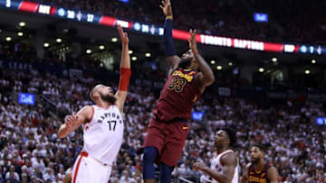 TORONTO, ON - MAY 01: LeBron James #23 of the Cleveland Cavaliers shoots the ball as Jonas Valanciunas #17 of the Toronto Raptors defends in the second half of Game One of the Eastern Conference Semifinals during the 2018 NBA Playoffs at Air Canada Centre on May 1, 2018 in Toronto, Canada. NOTE TO USER: User expressly acknowledges and agrees that, by downloading and or using this photograph, User is consenting to the terms and conditions of the Getty Images License Agreement. (Photo by Vaughn Ridley/Getty Images)