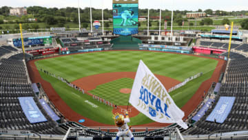 KANSAS CITY, MISSOURI - JULY 31: A general view the Kansas City Royals mascot Sluggerrr as he waves a flag during player introductions prior to the Opening Day gameat Kauffman Stadium on July 31, 2020 in Kansas City, Missouri. (Photo by Jamie Squire/Getty Images)