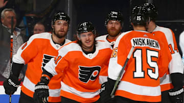 PHILADELPHIA, PA - JANUARY 08: Travis Konecny #11 of the Philadelphia Flyers celebrates his goal with Ivan Provorov #9, Claude Giroux #28, Sean Couturier #14, and Matt Niskanen #15 of the Philadelphia Flyers against the Washington Capitals in the first period at the Wells Fargo Center on January 8, 2020 in Philadelphia, Pennsylvania. The Flyers defeated the Capitals 3-2. (Photo by Mitchell Leff/Getty Images)