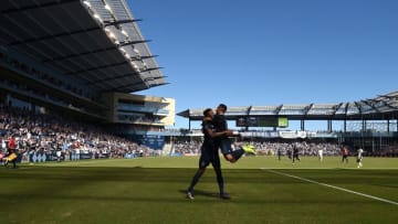 Sep 18, 2016; Kansas City, KS, USA; Sporting Kansas City forward Dom Dwyer (14) celebrates with defender Saad Abdul-Salaam (17) after scoring goals against the Los Angeles Galaxy in the second half at Children