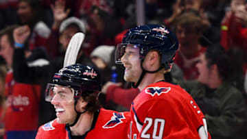 WASHINGTON, DC - JANUARY 05: Washington Capitals center Lars Eller (20) is congratulated by right wing T.J. Oshie (77) after scoring the game winning goal in overtime against the San Jose Sharks on January 5, 2020 at the Capital One Arena in Washington, D.C. (Photo by Mark Goldman/Icon Sportswire via Getty Images)