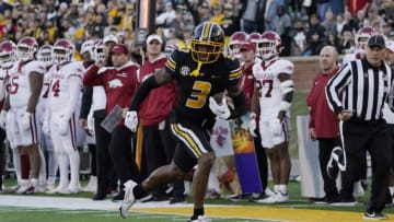 COLUMBIA, MISSOURI - NOVEMBER 25: Wide receiver Luther Burden III #3 of the Missouri Tigers runs against the Arkansas Razorbacks in the second half at Faurot Field/Memorial Stadium on November 25, 2022 in Columbia, Missouri. (Photo by Ed Zurga/Getty Images)