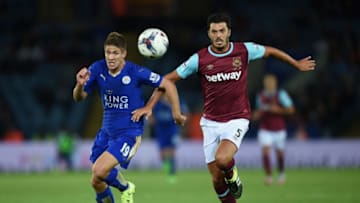 LEICESTER, ENGLAND - SEPTEMBER 22: Andrej Kramaric of Leicester in action with James Tomkins of West Ham during the Capital One Cup Third Round match between Leicester City and West Ham United at The King Power Stadium on September 22, 2015 in Leicester, England. (Photo by Michael Regan/Getty Images)