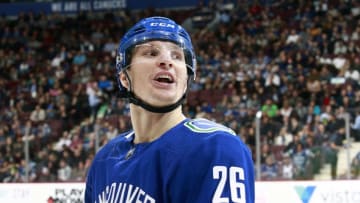 VANCOUVER, BC - NOVEMBER 2: Antoine Roussel #26 of the Vancouver Canucks looks on from the bench during their NHL game against the Colorado Avalanche at Rogers Arena November 2, 2018 in Vancouver, British Columbia, Canada. (Photo by Jeff Vinnick/NHLI via Getty Images)"n