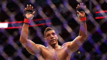 Aug 7, 2021; Houston, Texas, USA; Alonzo Menifield (red gloves) reacts to fight against Ed Herman (blue gloves) during UFC 265 at Toyota Center. Mandatory Credit: Troy Taormina-USA TODAY Sports