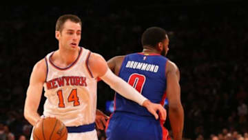 Jan 2, 2015; New York, NY, USA; New York Knicks center Jason Smith (14) drives around Detroit Pistons center Andre Drummond (0) during the third quarter at Madison Square Garden. Detroit Pistons won 97-81. Mandatory Credit: Anthony Gruppuso-USA TODAY Sports