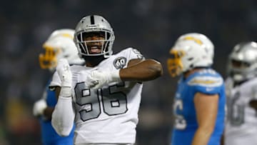 OAKLAND, CALIFORNIA - NOVEMBER 07: Clelin Ferrell #96 of the Oakland Raiders celebrates after sacking quarterback Philip Rivers #17 of the Los Angeles Chargers in the fourth quarter at RingCentral Coliseum on November 07, 2019 in Oakland, California. (Photo by Lachlan Cunningham/Getty Images)