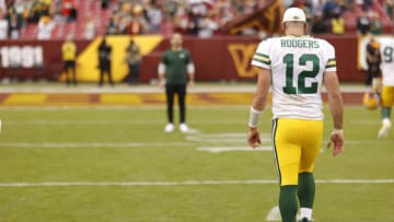 Oct 23, 2022; Landover, Maryland, USA; Green Bay Packers quarterback Aaron Rodgers (12) walks off the field after the Packers' game against the Washington Commanders at FedExField. Mandatory Credit: Geoff Burke-USA TODAY Sports