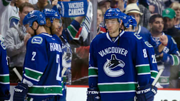 VANCOUVER, CANADA - APRIL 22: Dan Hamhuis #2, Manny Malhotra #27 and Chris Tanev #8 of the Vancouver Canucks skate off the ice after losing 2-1 in overtime against the Los Angeles Kings in Game Five of the Western Conference Quarterfinals during the 2012 NHL Stanley Cup Playoffs at Rogers Arena on April 22, 2012 in Vancouver, British Columbia, Canada.The Kings eliminated the Canucks after winning the series 4-2. (Photo by Rich Lam/Getty Images)