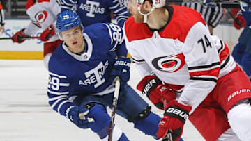 TORONTO,ON - DECEMBER 19: William Nylander #29 of the Toronto Maple Leafs skates on the check against the Carolina Hurricanes during an NHL game at the Air Canada Centre on December 19, 2017 in Toronto, Ontario, Canada. The Maple Leafs defeated the Hurricanes 8-1. (Photo by Claus Andersen/Getty Images)