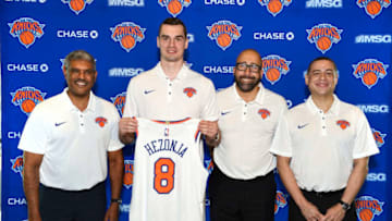 LAS VEGAS, NV - JULY 10: President Steve Mills, Mario Hezonja, Head Coach David Fizdale, and General Manager Scott Perry of the New York Knicks poses for a photo announcing Mario's signing on July 10, 2018 at Thomas and Mack Center in Las Vegas, Nevada. NOTE TO USER: User expressly acknowledges and agrees that, by downloading and or using this photograph, User is consenting to the terms and conditions of the Getty Images License Agreement. Mandatory Copyright Notice: Copyright 2018 NBAE (Photo by David Dow/NBAE via Getty Images)