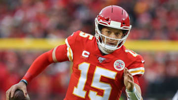 KANSAS CITY, MO - JANUARY 12: Kansas City Chiefs quarterback Patrick Mahomes (15) scrambles for a 14-yard gain with 1:05 left in the second quarter of an NFL Divisional round playoff game between the Houston Texans and Kansas City Chiefs on January 12, 2020 at Arrowhead Stadium in Kansas City, MO. (Photo by Scott Winters/Icon Sportswire via Getty Images)