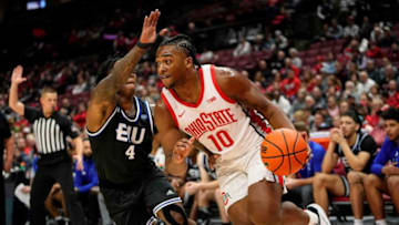 Nov 16, 2022; Columbus, OH, USA; Ohio State Buckeyes forward Brice Sensabaugh (10) dribbles past Eastern Illinois Panthers guard Yaakema Rose Jr. (4) during the first half of the NCAA men's basketball game at Value City Arena. Mandatory Credit: Adam Cairns-The Columbus DispatchBasketball Eastern Illinois At Ohio State